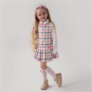 Blue and cream check dress by Daga for girls it has a pink velvet bow on the side
