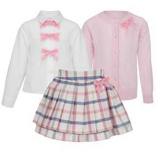 Daga white long sleeve shirt it has velvet bow details up the front, check fluffy chic skirt with a velvet bow on the side matched with a pink long sleeve cardigan with a pink velvet bow on the collar