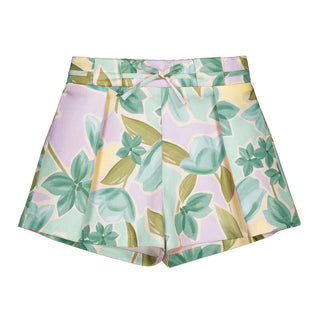 Shorts with a tropical leaf pattern on a white background