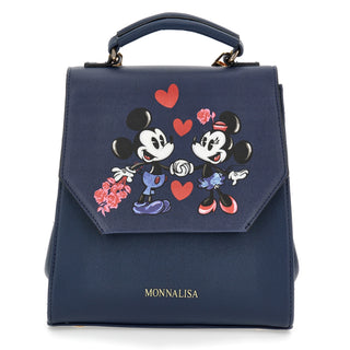 Navy leather bag by Monnalisa, it has the Disney Mickey and Minnie design on the front with button on the front to open and close. It has adjustable shoulder straps 
