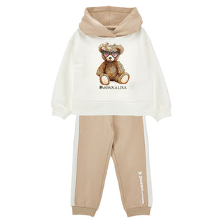 Cream tracksuit for girls by Monnalisa, it has an embellished teddy bear design on the front with the Monnalisa logo underneath. The hood is beige to match the cuffed tracksuit bottoms. The trousers have a cream strip on the outdside of the leg with the Monnalisa Logo in white 