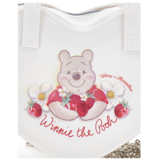 Close-up of Winnie The Pooh strawberry artwork on Monnalisa white heart bag
