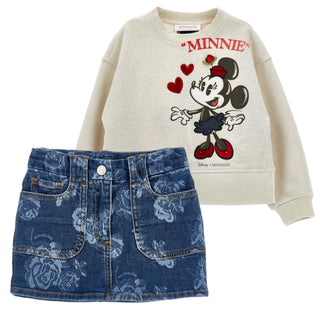 Beige jumper with Disney Minnie Mouse print on the front it is matched with a blue denim skirt with roses printed all over. 