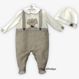 Petit Italia brown baby grow with a puppy appliqué in the middle it has navy and blue stripe piping