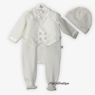 White sleep suit for baby boys by Petit it has a white stitched on satin waist jacket and bow tie on the collar it comes with a white hat with a satin piping