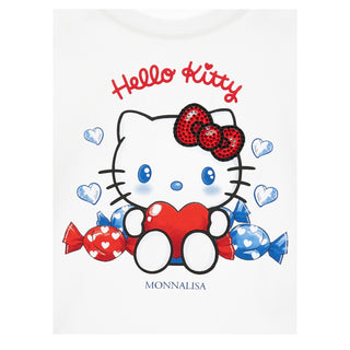 Hello Kitty character with red and blue candies on a white background