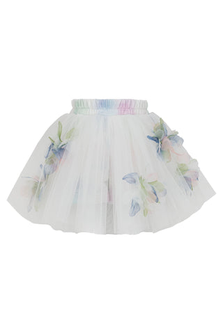 White skirt with floral patterns on a white background