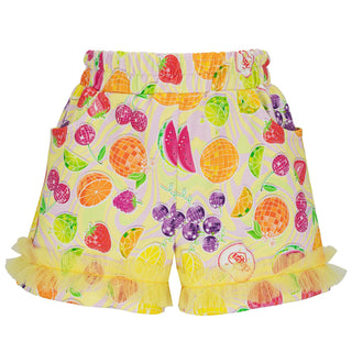 Colorful fruit-patterned shorts with ruffled edges on a white background