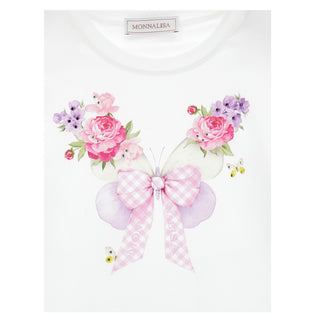 Close up of butterfly floral print on Monnalisa girls white top