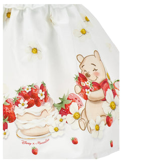 Close-up of Monnalisa Disney skirt with pooh, strawberry’s and daisies
