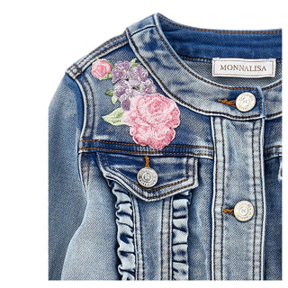 Close-up of pink floral embroidery on Monnalisa girls denim jacket shoulder