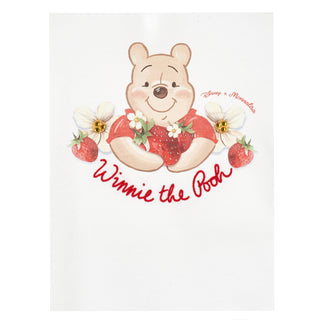 Winnie the Pooh character with strawberries and flowers on a white background